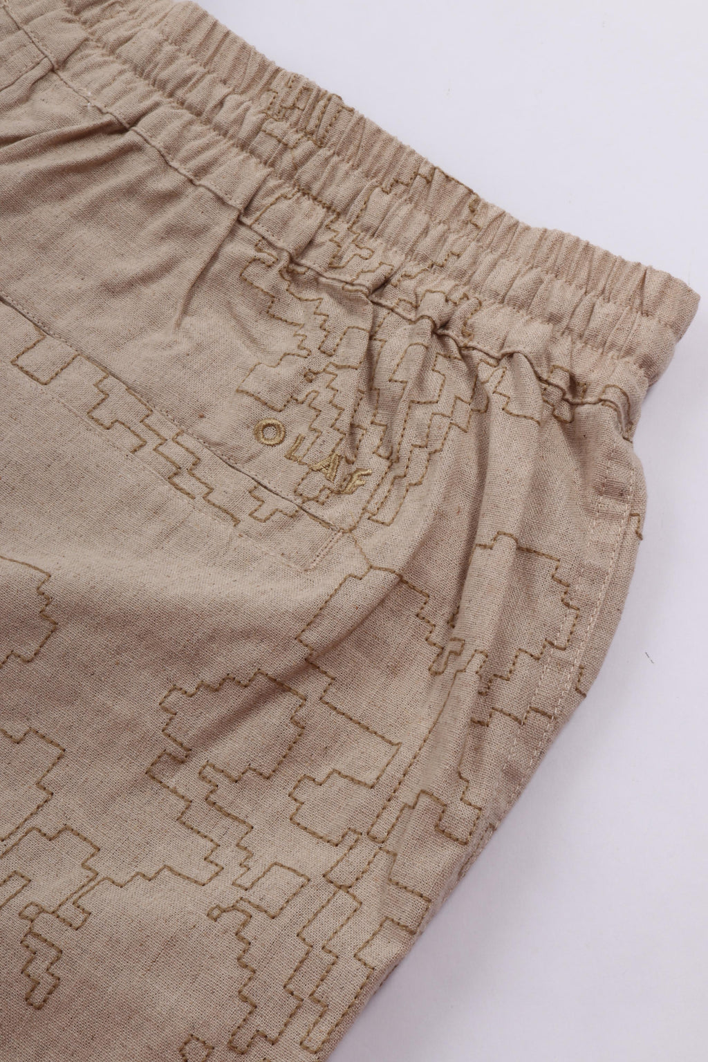 Embroidered flower shorts cement
