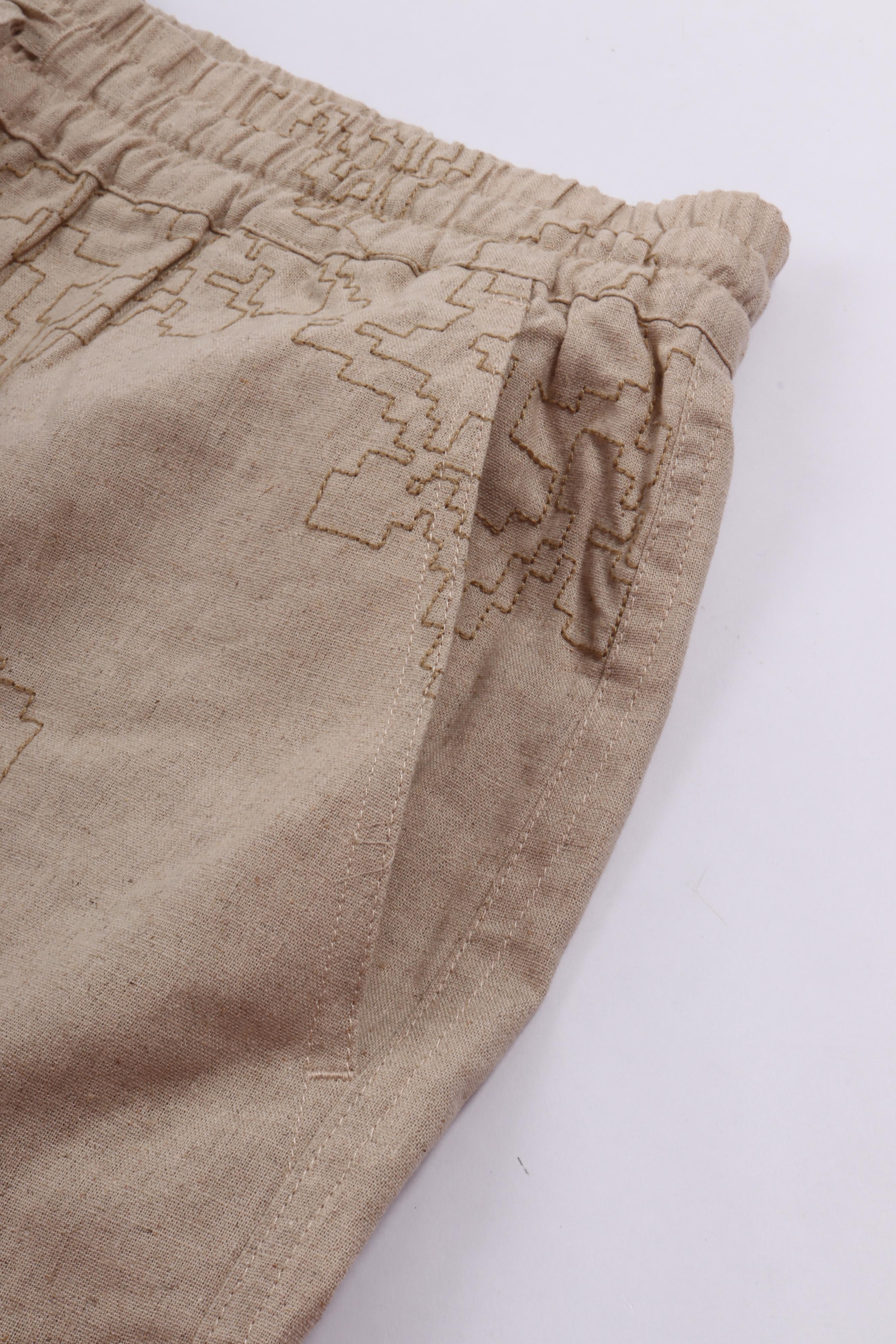 Embroidered flower shorts cement