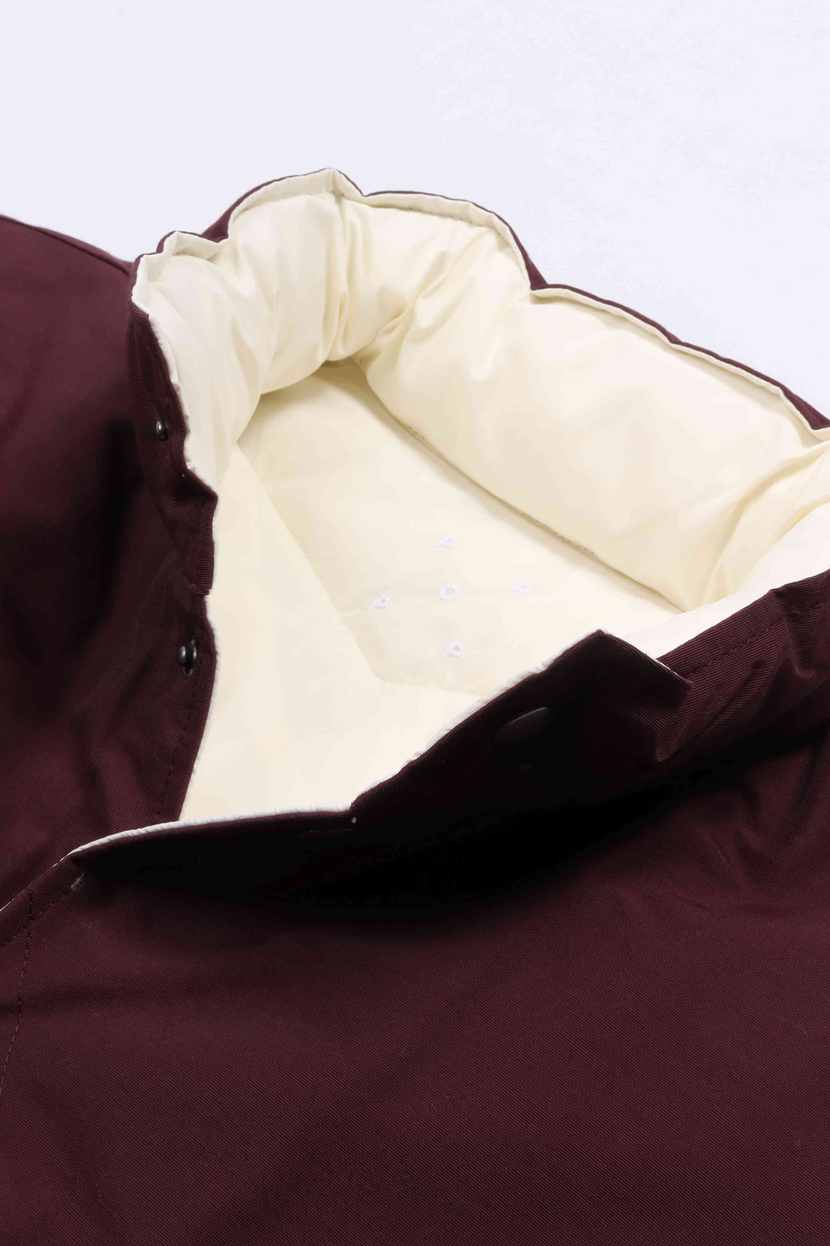 Quilted rev. vest fudge / off whit