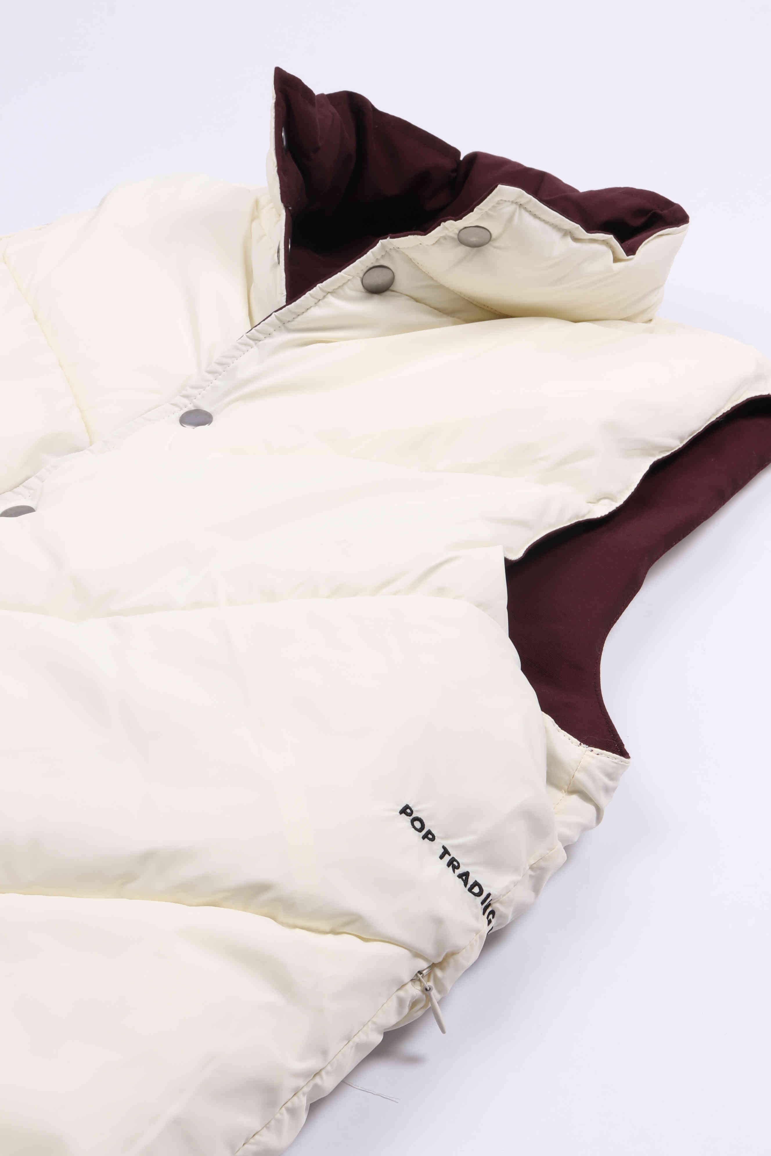 Quilted rev. vest fudge / off whit