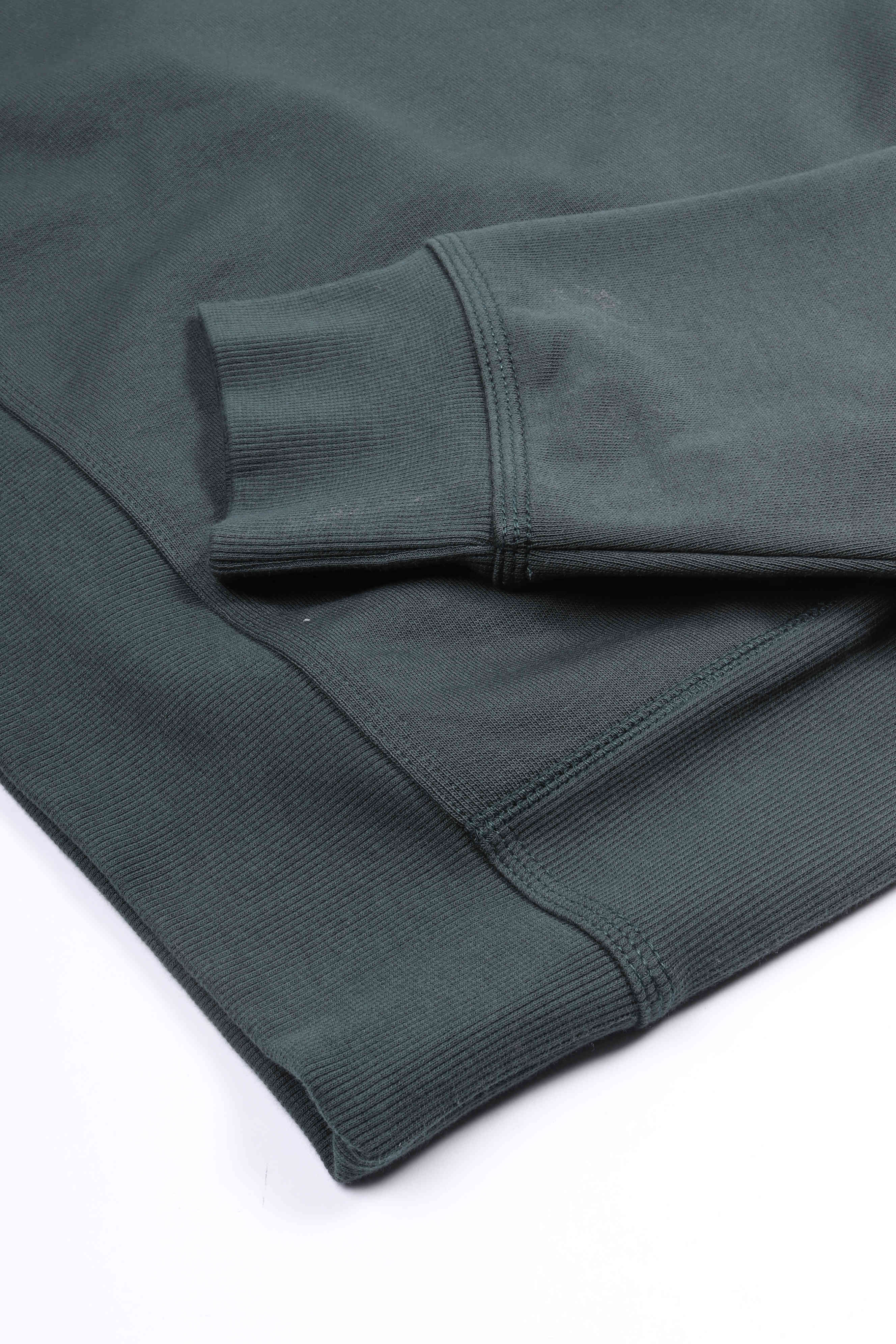 A. script sweater kale green