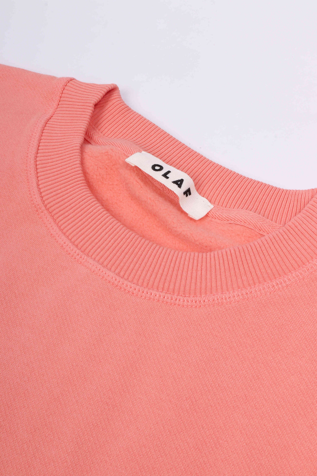 Brushstroke face crewneck burnt coral